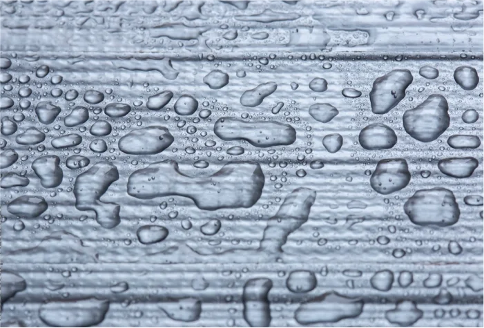 Waterdrops on white surface